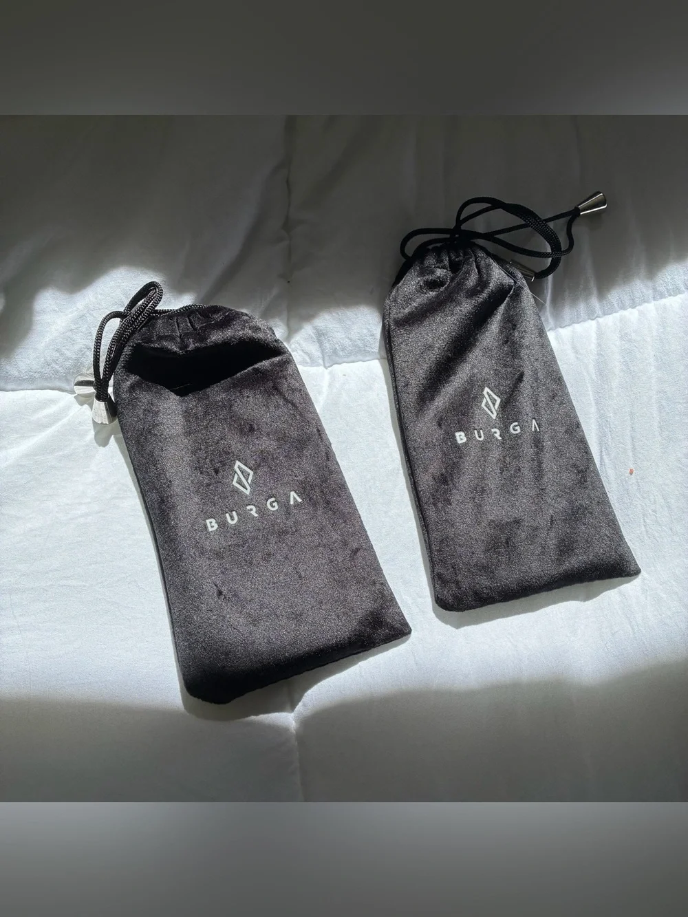 2 BURGA iPhone 13 phone cases with bags